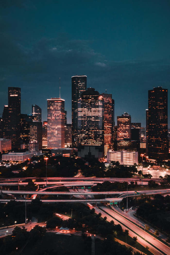 a houston city skyline at sunset